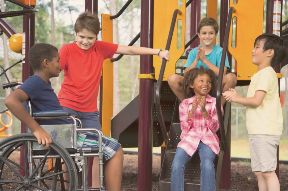 Group of diverse children in a playground.
